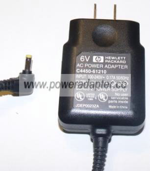 HEWLETT PACKARD C4450-61210 AC ADAPTER 6V 1A NEW HEWLETT PACKARD C4450-61210 AC ADAPTER 6V 1A NEW