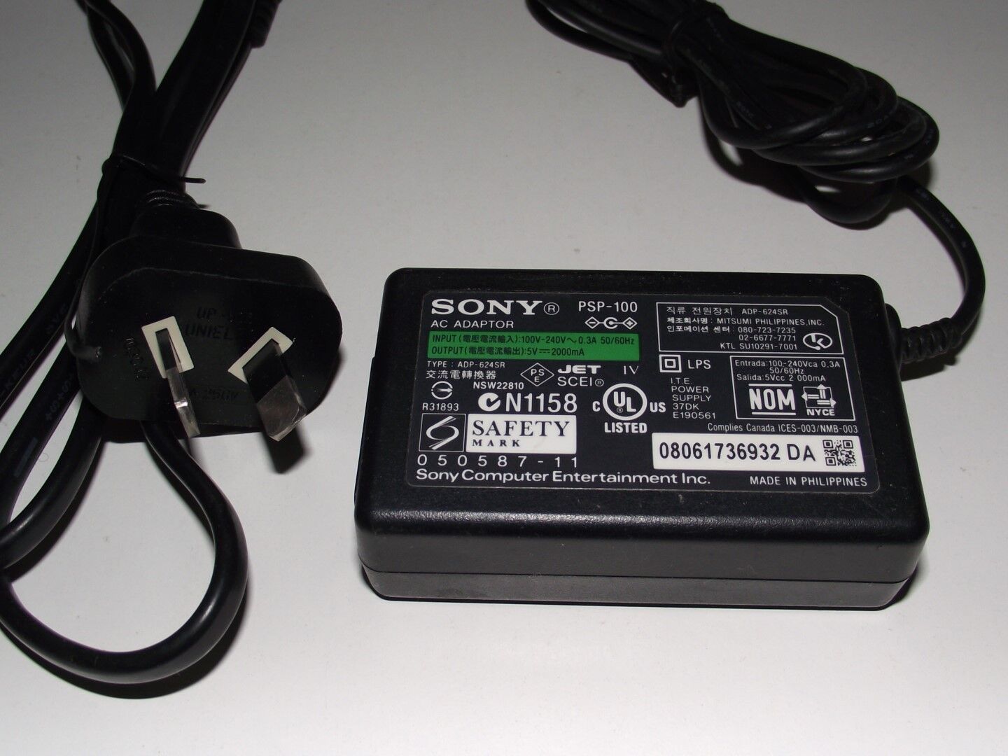 Genuine Playstation PSP 1000 Power Adapter Cord Portable Wall Charger 2000mA Model: PSP-1000 Colour: Black Country/R Genuine Playstation PSP 1000 Power Adapter Cord Portable Wall Charger 2000mA Model: PSP-1000 Colour: Black Country/R