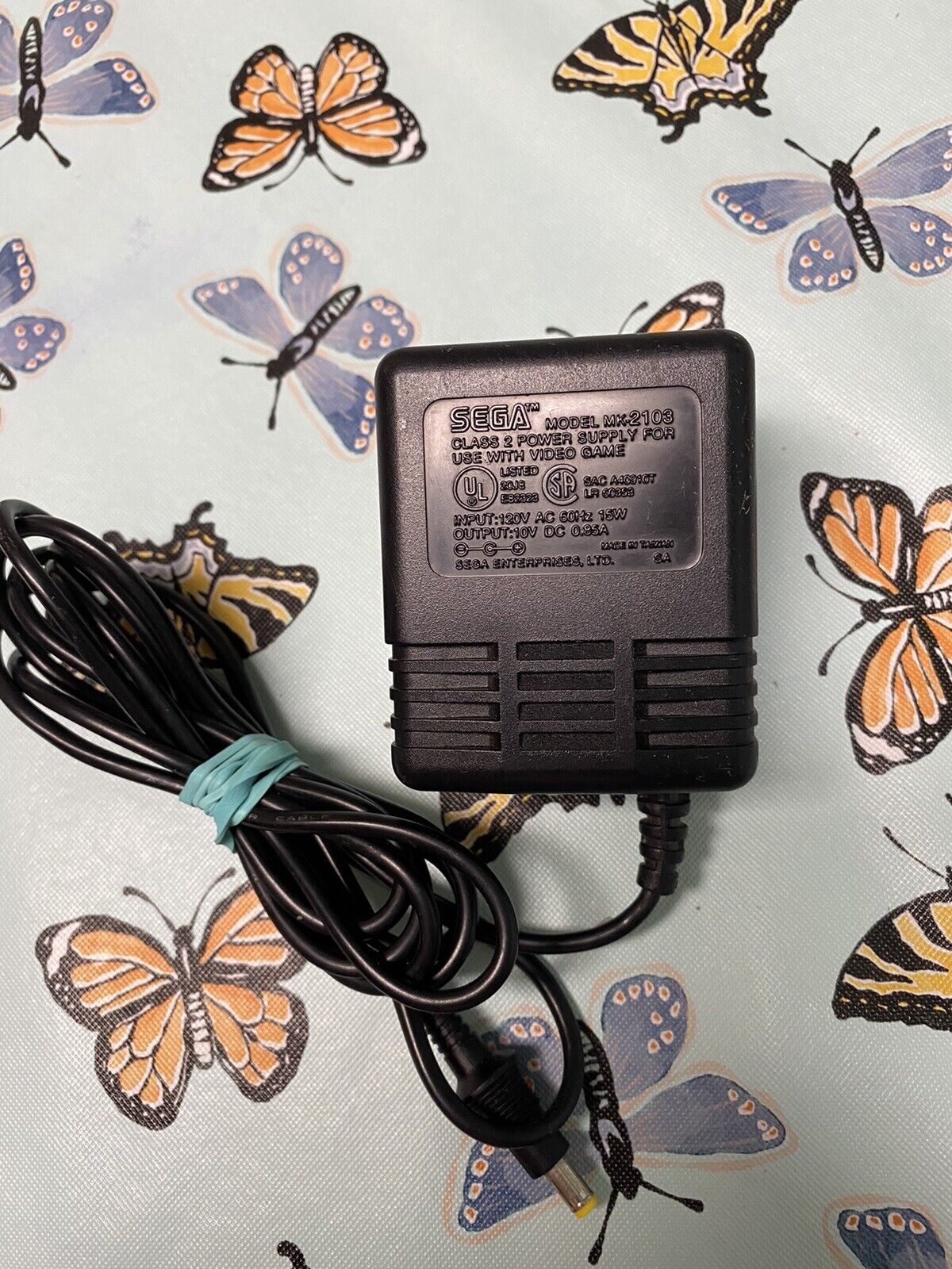 Sega TM MK-2103 Class 2 Power Supply For Use With Video Game 120V AC 60 Hz 15 W Brand: Sega TM Type: AC/DC Adapter Sega TM MK-2103 Class 2 Power Supply For Use With Video Game 120V AC 60 Hz 15 W Brand: Sega TM Type: AC/DC Adapter